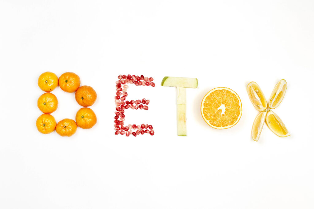 An image of the word 'detox' spelt with fruits